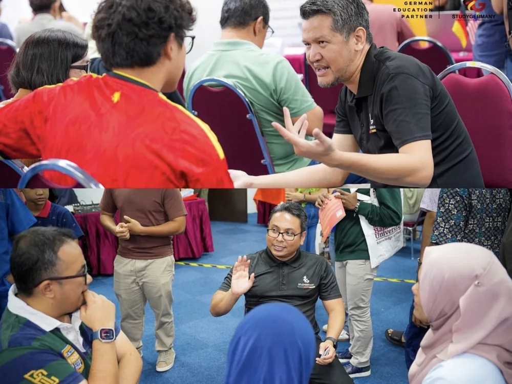Persönliche Beratung von Teilnehmenden bei einer Bildungsveranstaltung in Malaysia